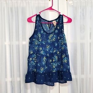 Sheer Sleeveless floral top with bottom ruffle